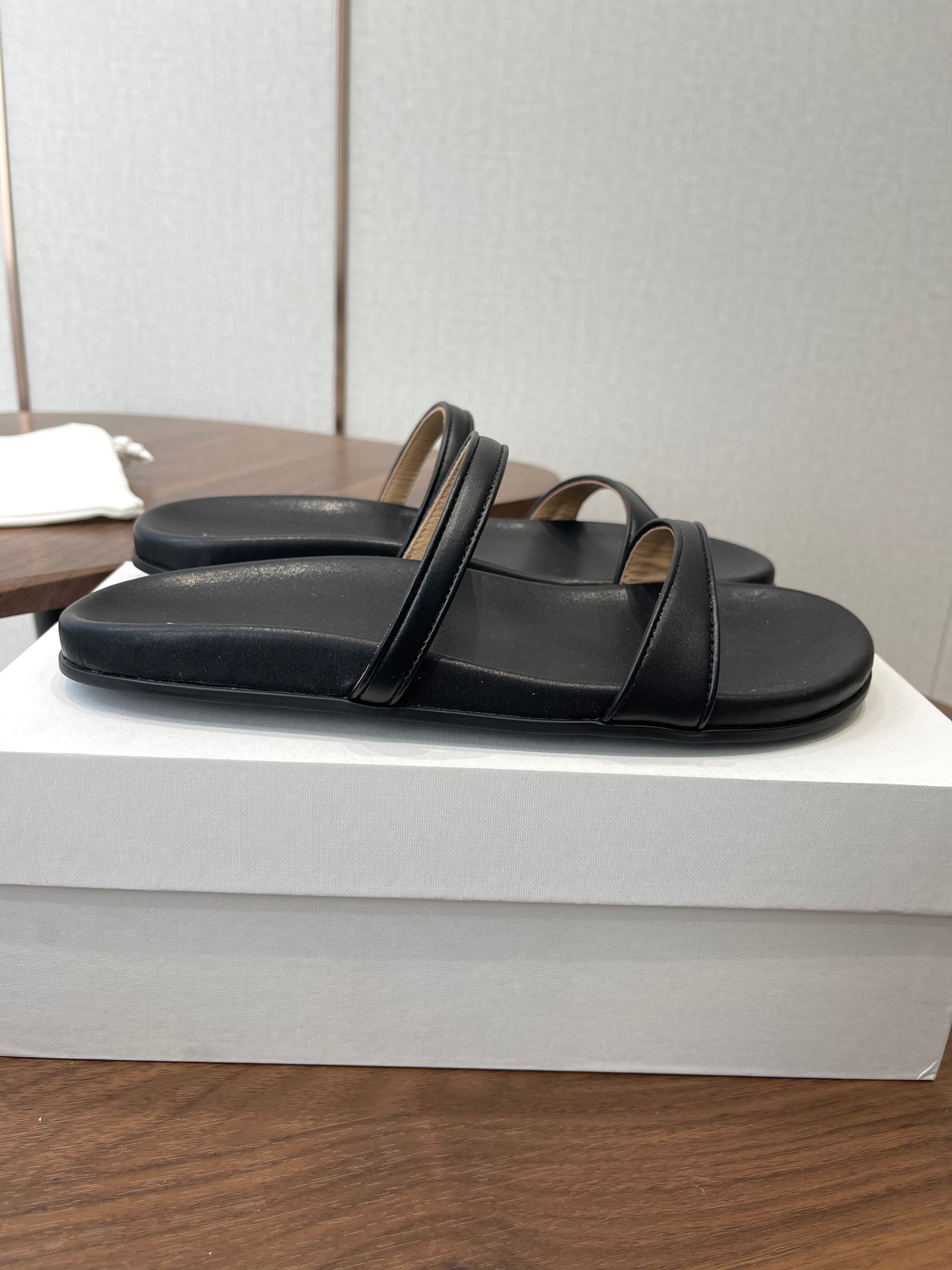 THE ROW 26S DOUBLE STRAP FLAT SANDALS IN BLACK CALFSKIN