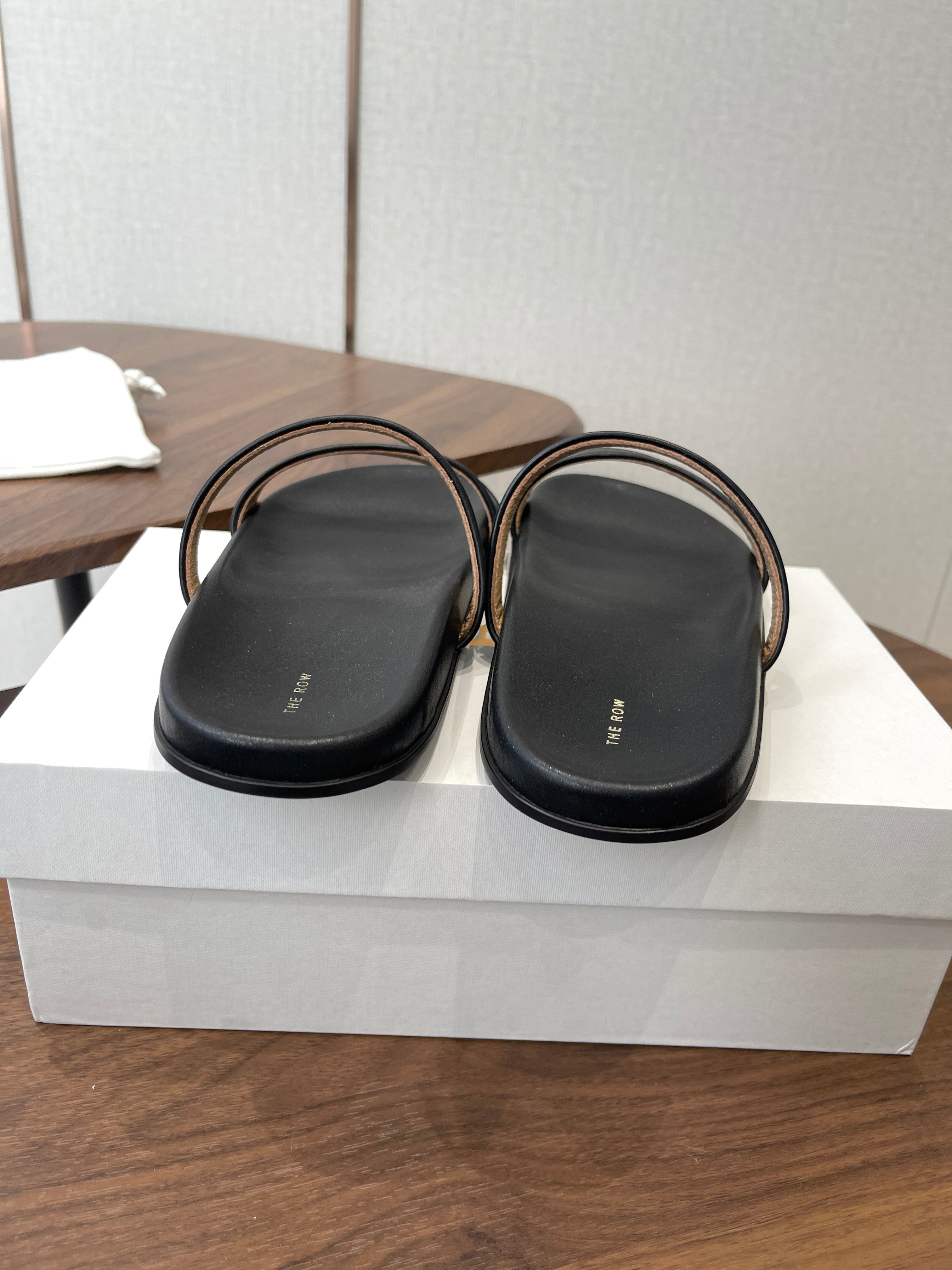 THE ROW 26S DOUBLE STRAP FLAT SANDALS IN BLACK CALFSKIN