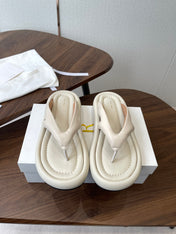 THE ROW 26S PUFFED THONG SANDALS IN IVORY WHITE CALFSKIN