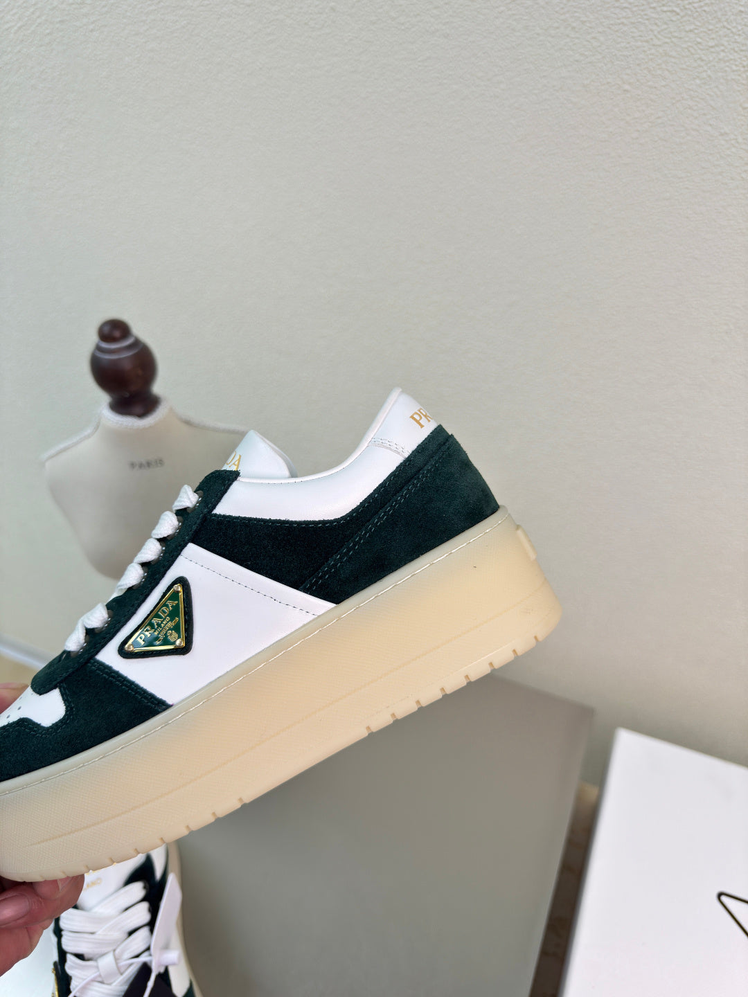 PRADA 26S DOWNTOWN THICK SOLE SNEAKERS IN WHITE CALFSKIN AND BLACK SUEDE