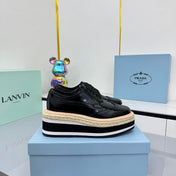 PRADA 25S FLAT WEDGE SHOES 60MM IN BLACK GLOSSY CALFSKIN