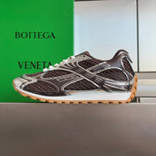 BOTTEGA VENETA 26S SNEAKERS IN DARK BROWN AND SILVER TPU MATERIAL