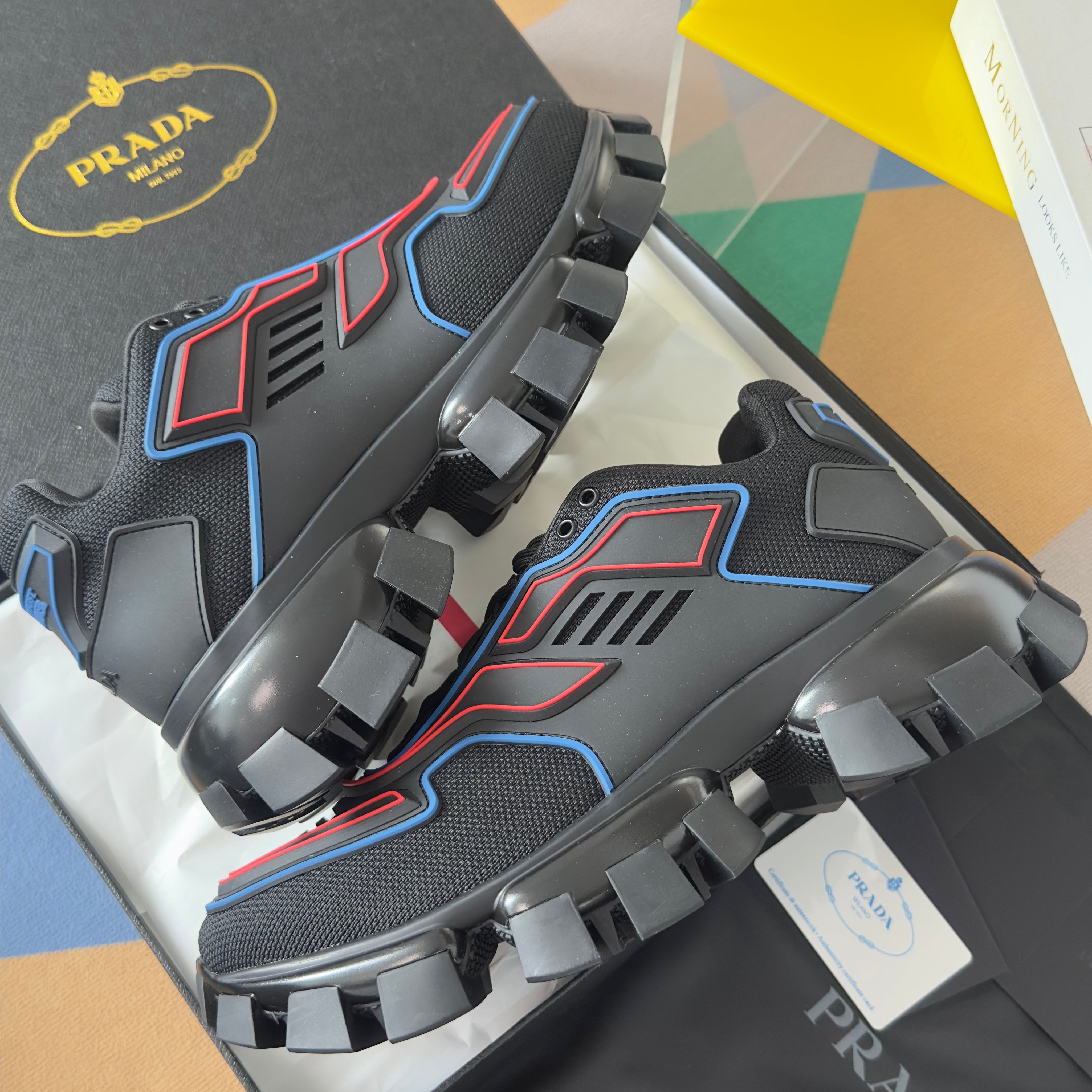 PRADA 26S CLOUDBUST THUNDER SNEAKERS 60MM IN BLACK AND RED MESH FABRIC AND TPU
