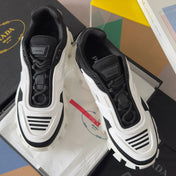 PRADA 26S CLOUDBUST THUNDER SNEAKERS 60MM IN WHITE AND BLACK MESH FABRIC AND TPU