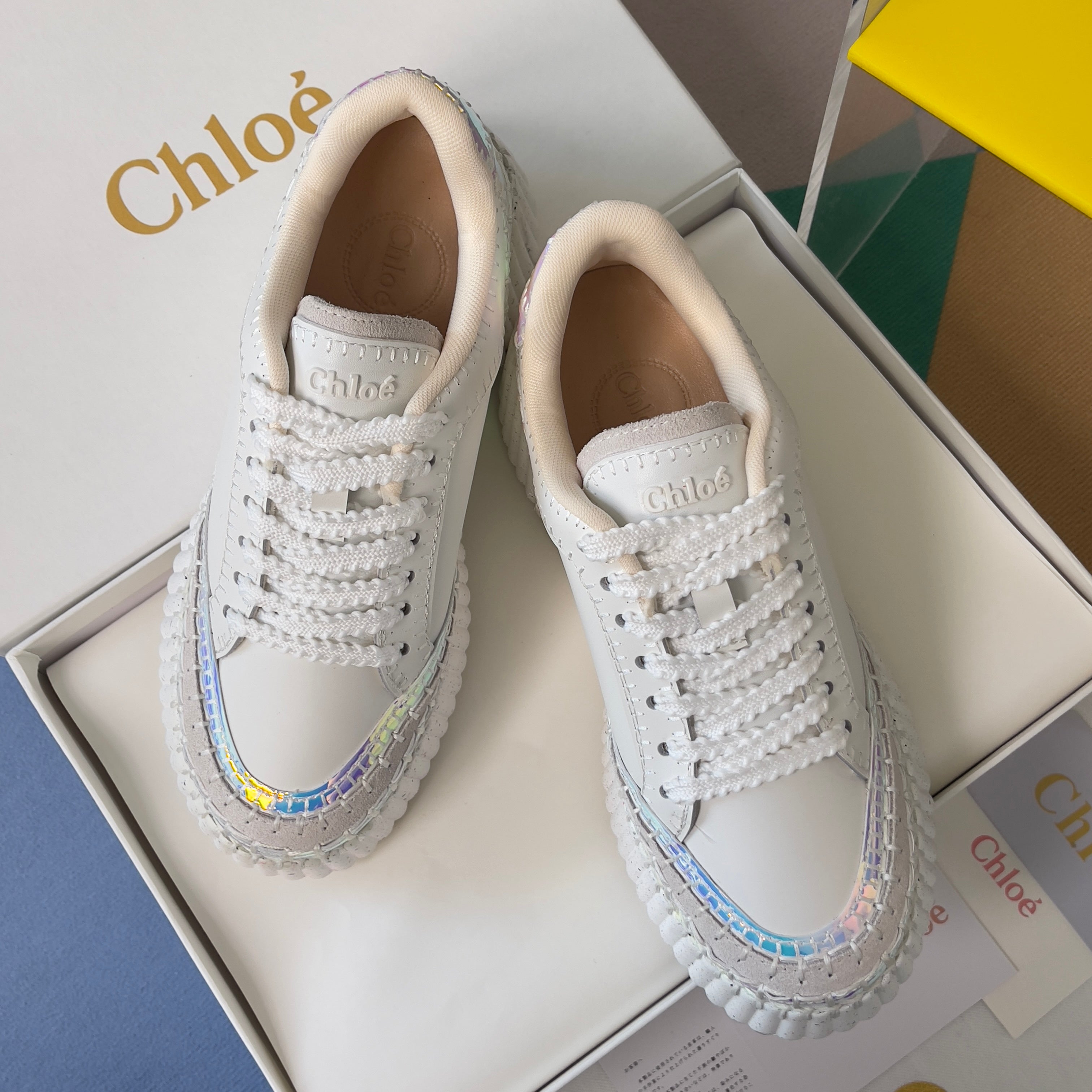 CHLOÉ 26S WEDGE SNEAKERS 70 MM IN WHITE CALFSKIN AND HOLOGRAM