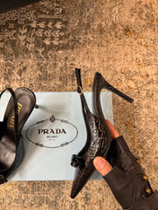 PRADA 25S SLINGBACK HIGH HEELS 75 MM IN BLACK EMBOSSED COWHIDE