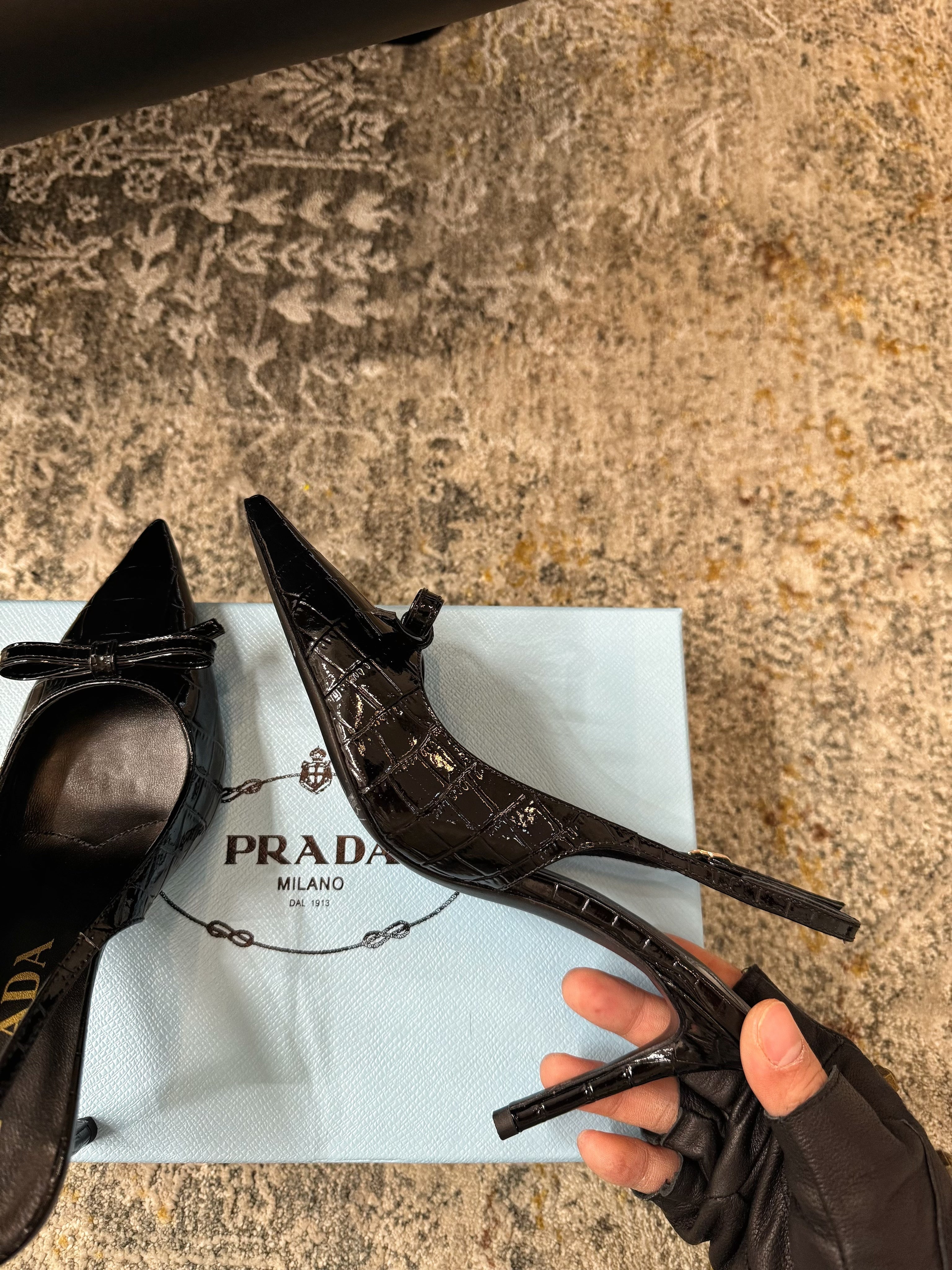 PRADA 25S SLINGBACK HIGH HEELS 75 MM IN BLACK EMBOSSED COWHIDE