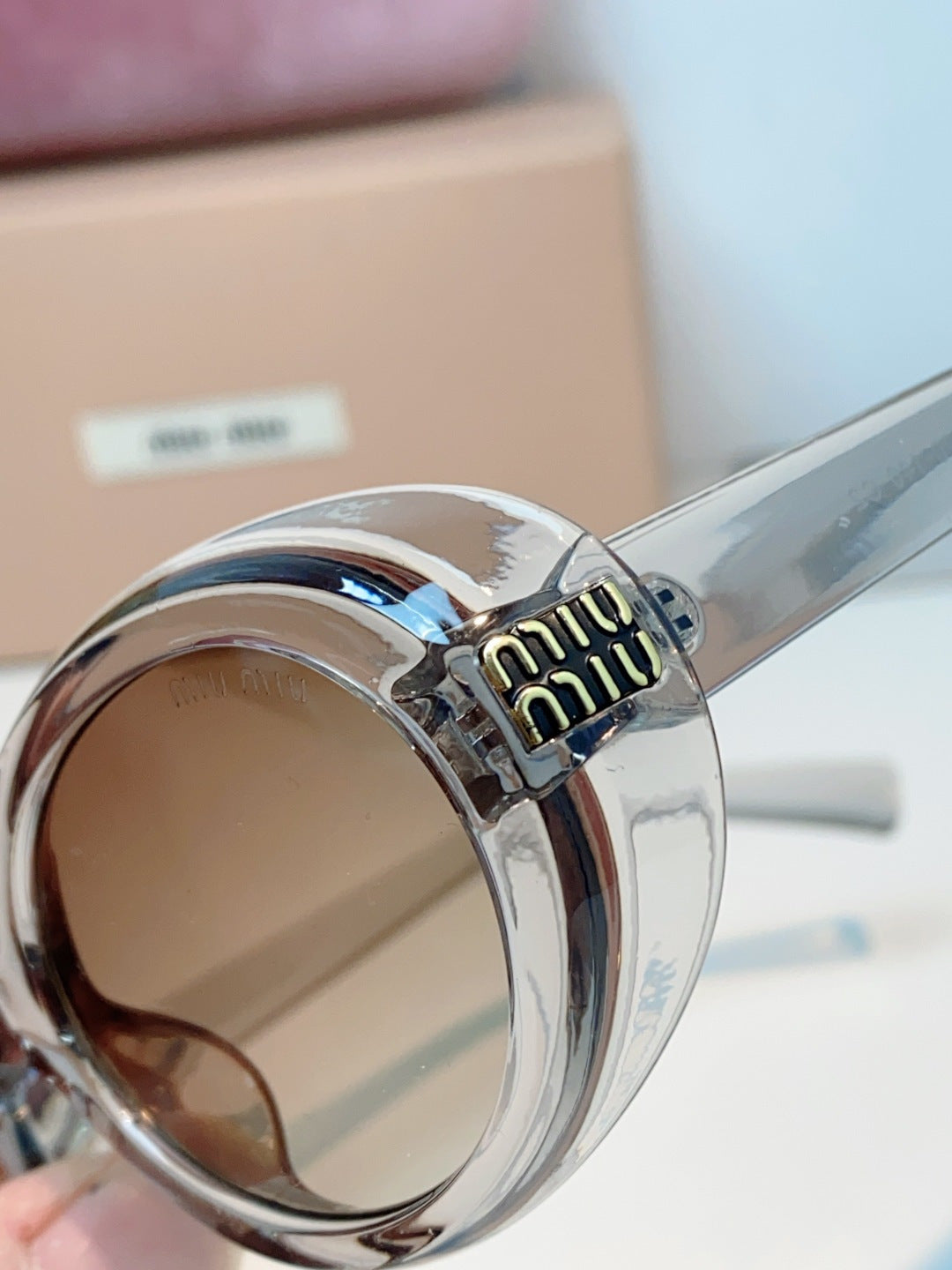 MIUMIU 26S OVAL FRAME IN ACETATE 424528