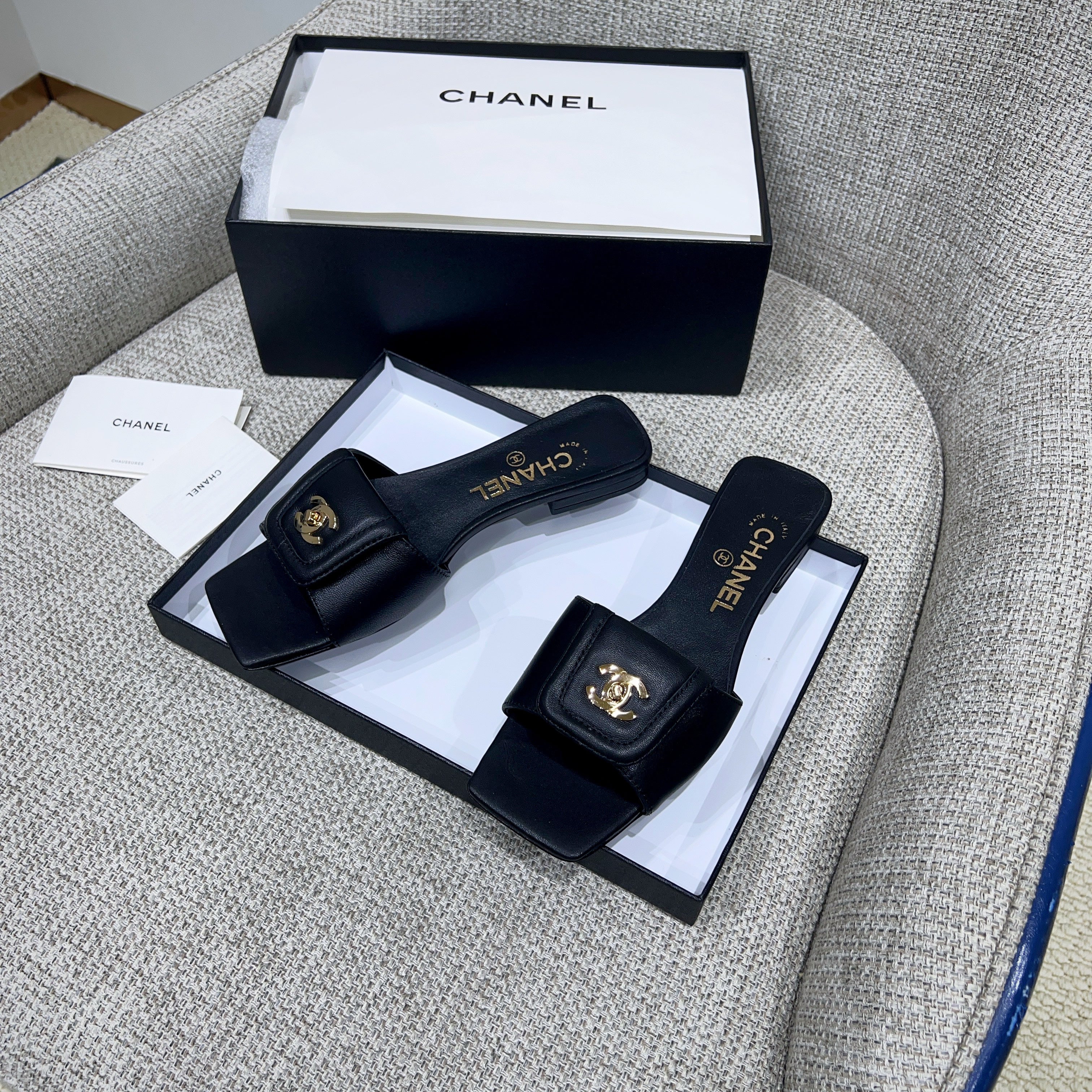 CHANEL 26S FLAT SLIDES IN BLACK LAMBSKIN