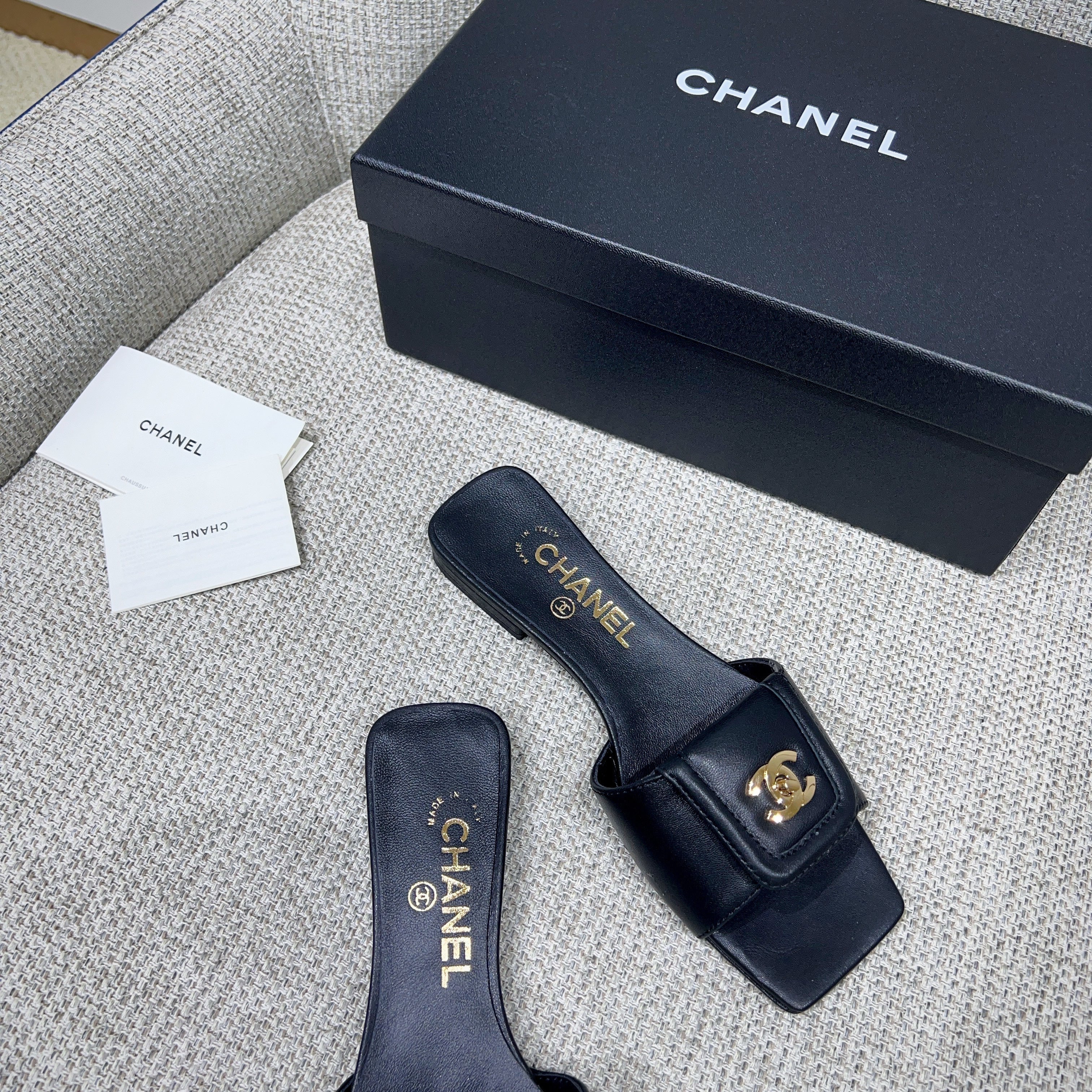 CHANEL 26S FLAT SLIDES IN BLACK LAMBSKIN