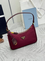 PRADA 25S RE-EDITION 2005 MINI BAG 22 IN BURGUNDY RE-NYLON AND SAFFIANO