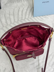 PRADA 25S DUET BUCKET BAG 23 IN BURGUNDY RE-NYLON GOLD HARDWARE