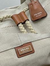 PRADA 25S DRAWSTRING BACKPACK 55 IN BEIGE CANVAS LINEN SILVER HARDWARE