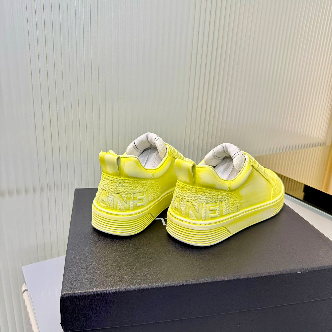 CHANEL 26S LOW-TOP SNEAKERS IN LIGHT YELLOW CALFSKIN