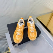 CHANEL 26S LOW-TOP SNEAKERS IN GOLDEN ORANGE CALFSKIN