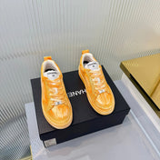 CHANEL 26S LOW-TOP SNEAKERS IN GOLDEN ORANGE CALFSKIN