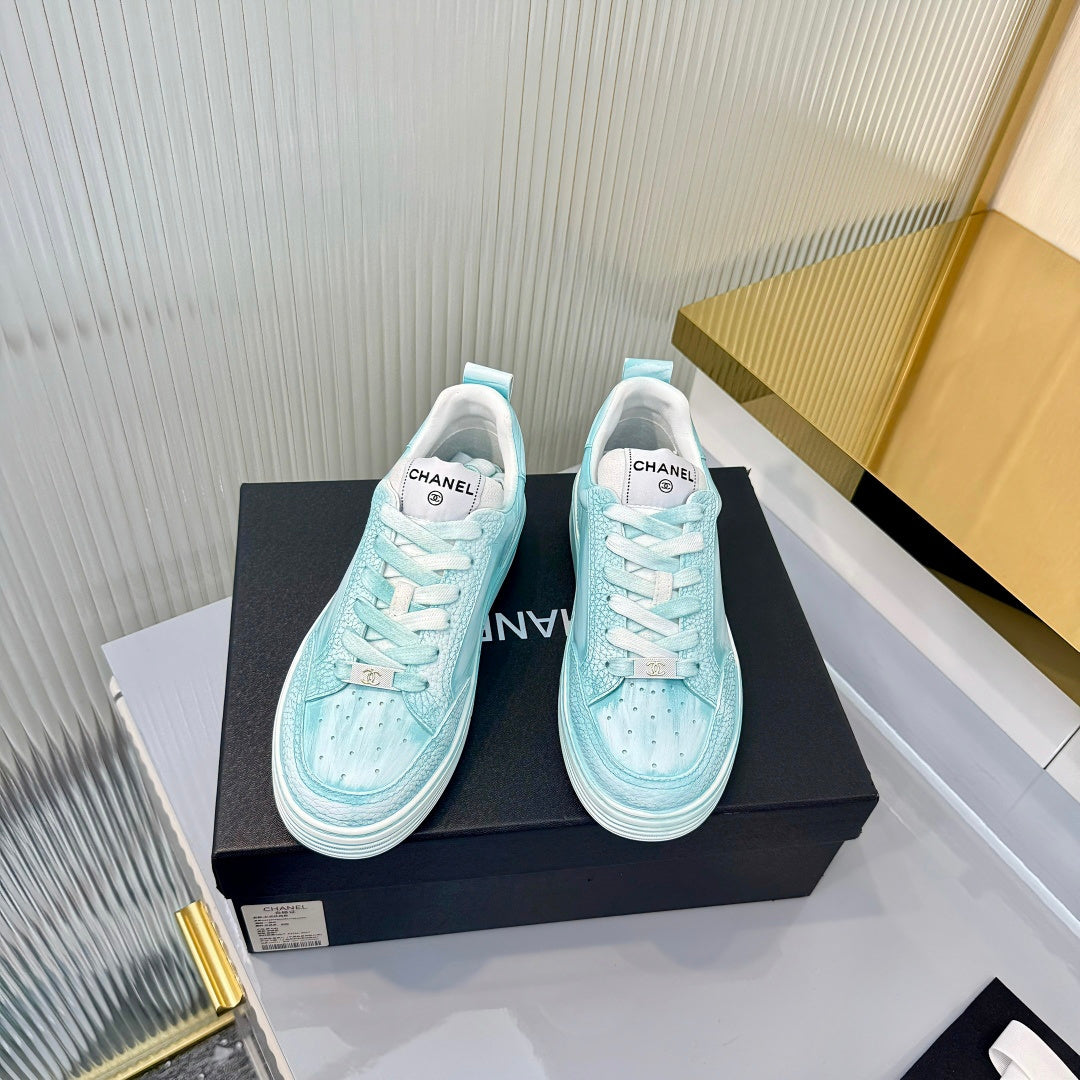 CHANEL 26S LOW-TOP SNEAKERS IN LIGHT MINT BLUE CALFSKIN