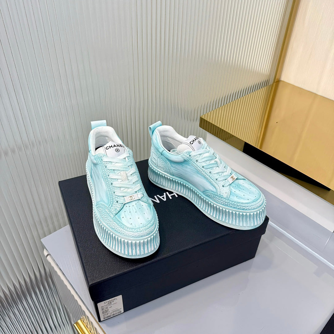 CHANEL 26S LOW-TOP SNEAKERS IN LIGHT MINT BLUE GRAFFITI PATTERN CALFSKIN