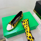 CHANEL 26S FLAT SHOES IN YELLOW AND BLACK LEOPARD PRINT PONY HAIR
