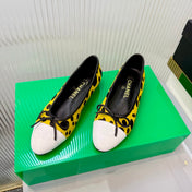 CHANEL 26S FLAT SHOES IN YELLOW AND BLACK LEOPARD PRINT PONY HAIR