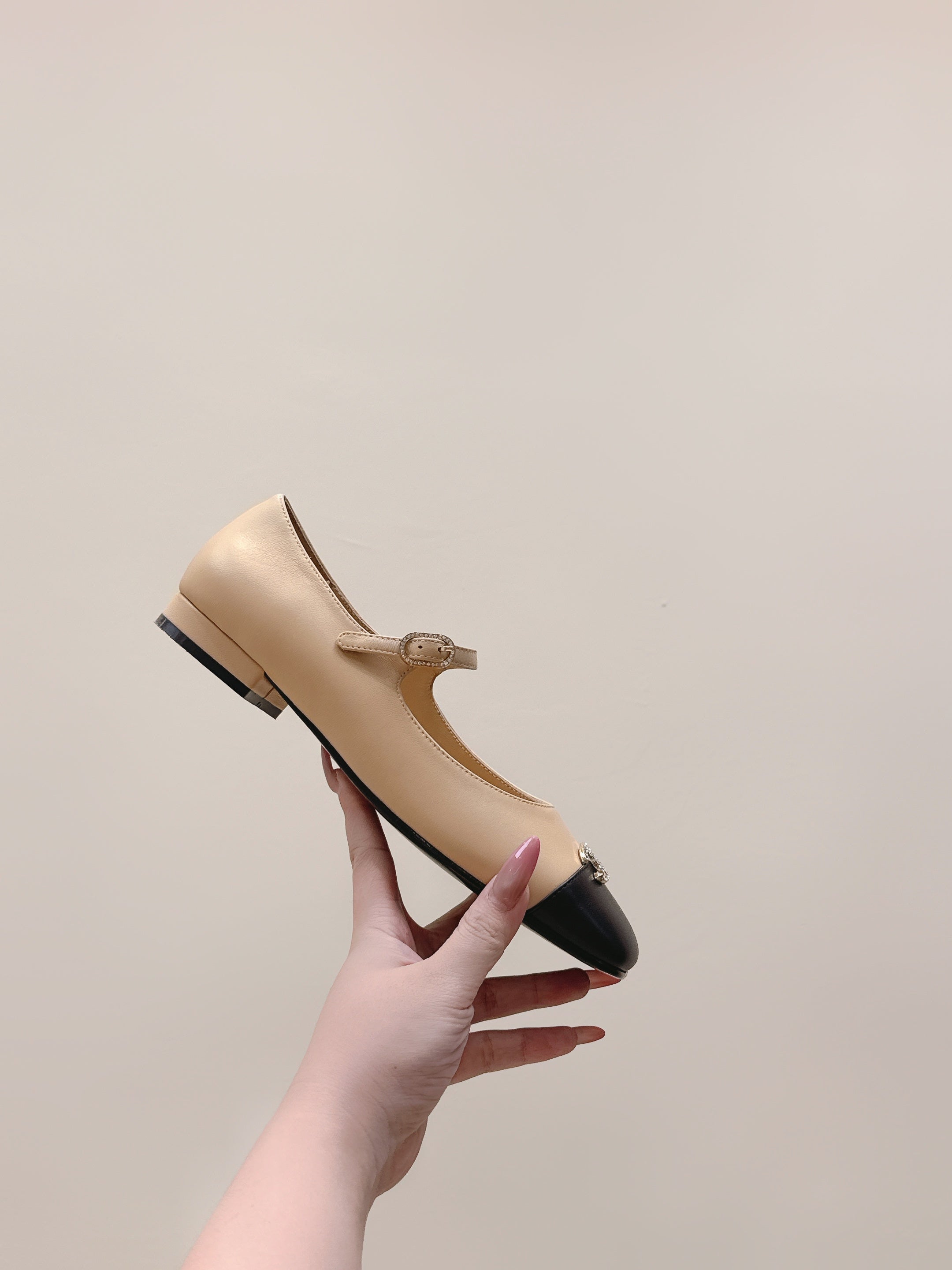 CHANEL 25S MARY JANE FLATS IN BEIGE LAMBSKIN WITH BLACK CAP TOE SILVER HARDWARE