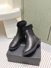 CHANEL 25S CALF-HIGH BOOTS IN BLACK CALFSKIN LINED WITH SHEEPSKIN