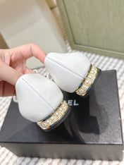 CHANEL 25S MARY JANE BALLET FLATS IN WHITE LAMBSKIN BLACK PATENT CAP TOE WITH BOW