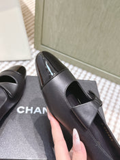 CHANEL 25S MARY JANE BALLET FLATS IN BLACK LAMBSKIN PATENT CAP TOE WITH BOW