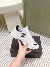 CHANEL 25S LUXURY SNEAKERS IN WHITE CALFSKIN AND SUEDE