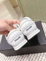 CHANEL 25S SNEAKERS IN WHITE CALFSKIN AND SUEDE