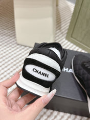 CHANEL 25S SNEAKERS IN BLACK CALFSKIN AND SUEDE