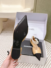 CHANEL 25S ESPADRILLE FLATS IN BEIGE AND BLACK CALFSKIN WITH PEARL STRAP