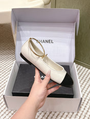 CHANEL 25S BALLERINA SHOES IN WHITE AND BLACK CALFSKIN GOLD HARDWARE