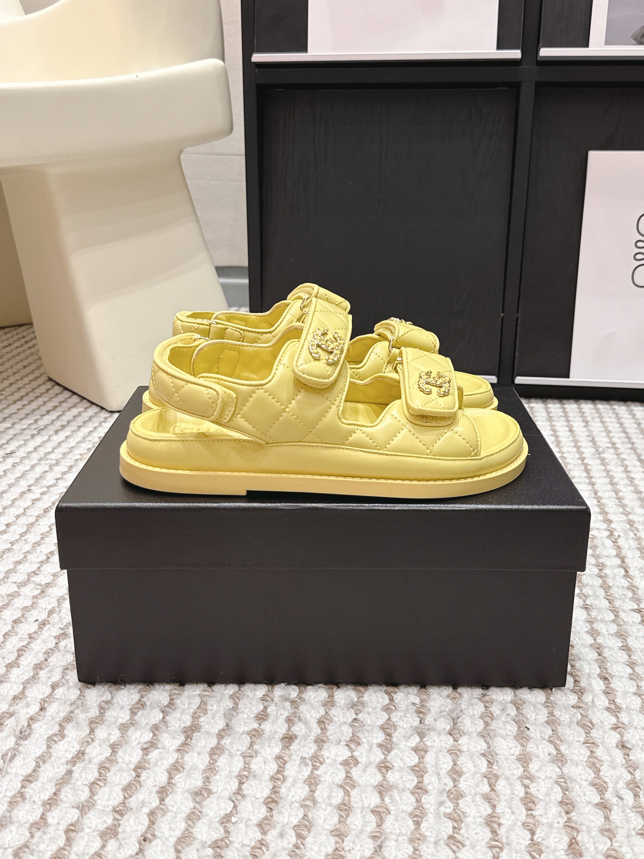CHANEL 26S QUILTED DAD SANDALS IN YELLOW CALFSKIN