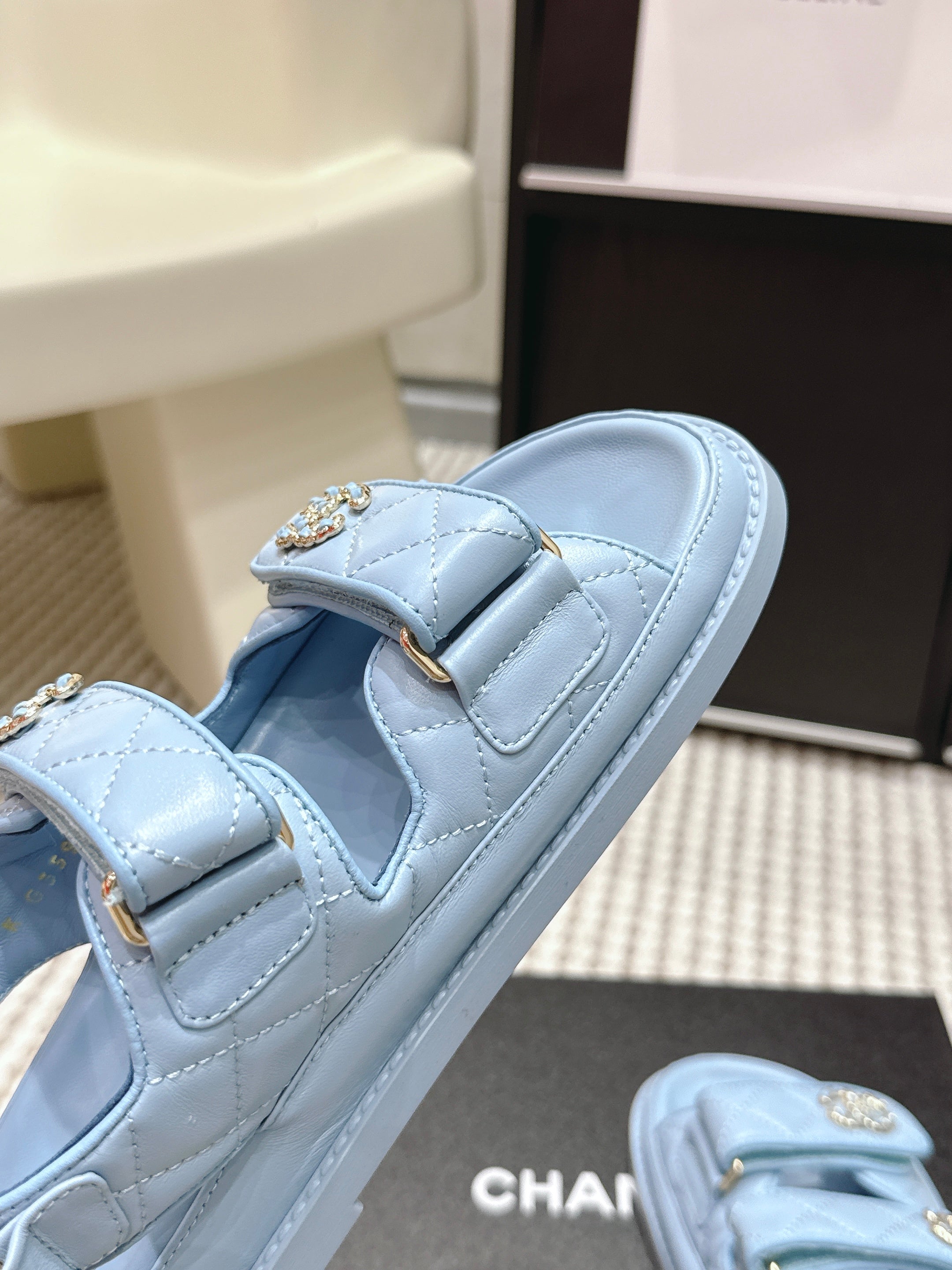 CHANEL 26S QUILTED DAD SANDALS IN LIGHT BLUE CALFSKIN