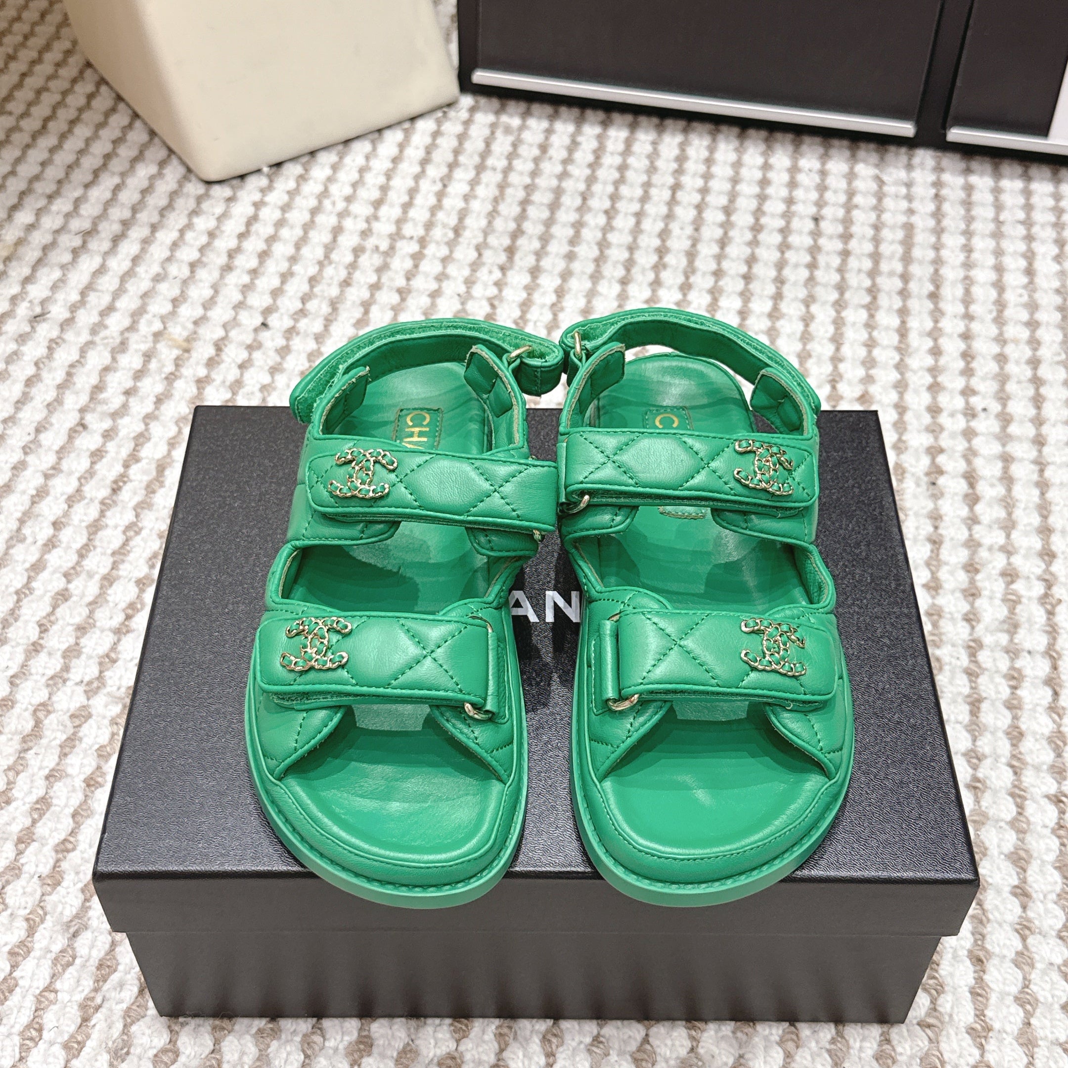 CHANEL 26S QUILTED DAD SANDALS IN GREEN CALFSKIN