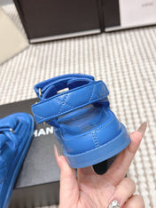 CHANEL 26S QUILTED DAD SANDALS IN BLUE CALFSKIN