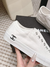 CHANEL 26S SNEAKERS IN WHITE CANVAS