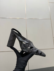 ALAIA 26S HEELED SLINGBACKS IN BLACK PYTHON-EMBOSSED LEATHER