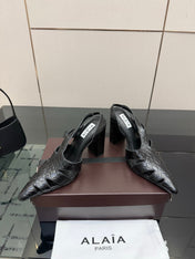 ALAIA 26S HEELED SLINGBACKS IN BLACK CROC-EMBOSSED LEATHER