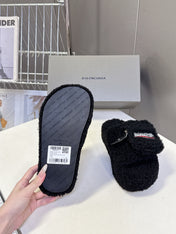 BALENCIAGA 25S SLIPPERS IN BLACK FAUX SHEARLING