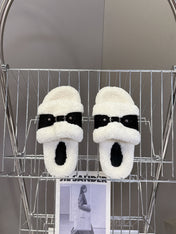 BALENCIAGA 25S SLIPPERS IN BLACK SUEDE AND WHITE WOOL