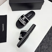 CC SLIDE SANDALS 25S IN BLACK FABRIC AND CALFSKIN