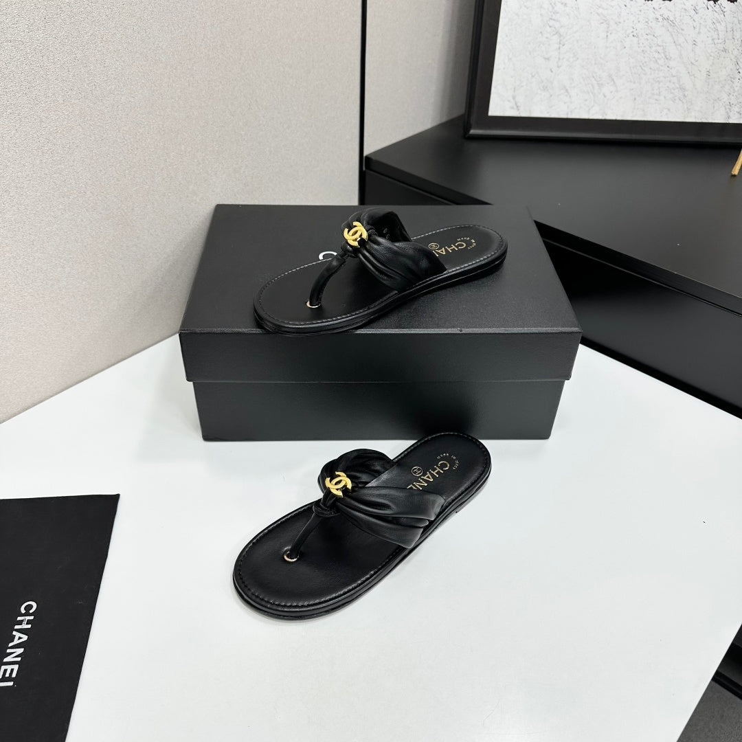 CHANEL 26S THONG SANDALS IN BLACK LAMBSKIN