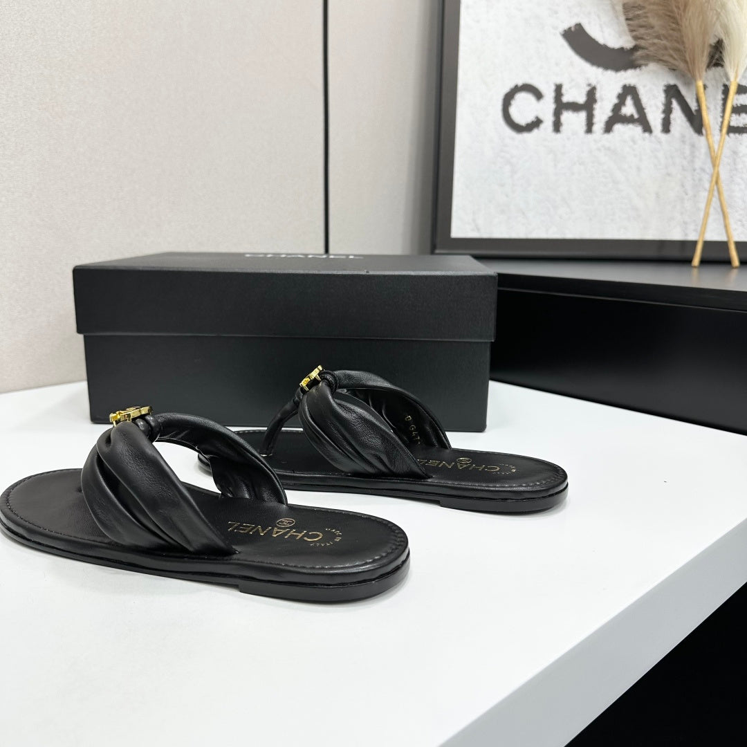CHANEL 26S THONG SANDALS IN BLACK LAMBSKIN