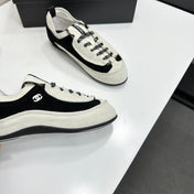 CHANEL SNEAKERS METIERS D-ART 26S IN BLACK AND WHITE SUEDE