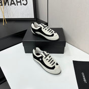 CHANEL SNEAKERS METIERS D-ART 26S IN BLACK AND WHITE SUEDE