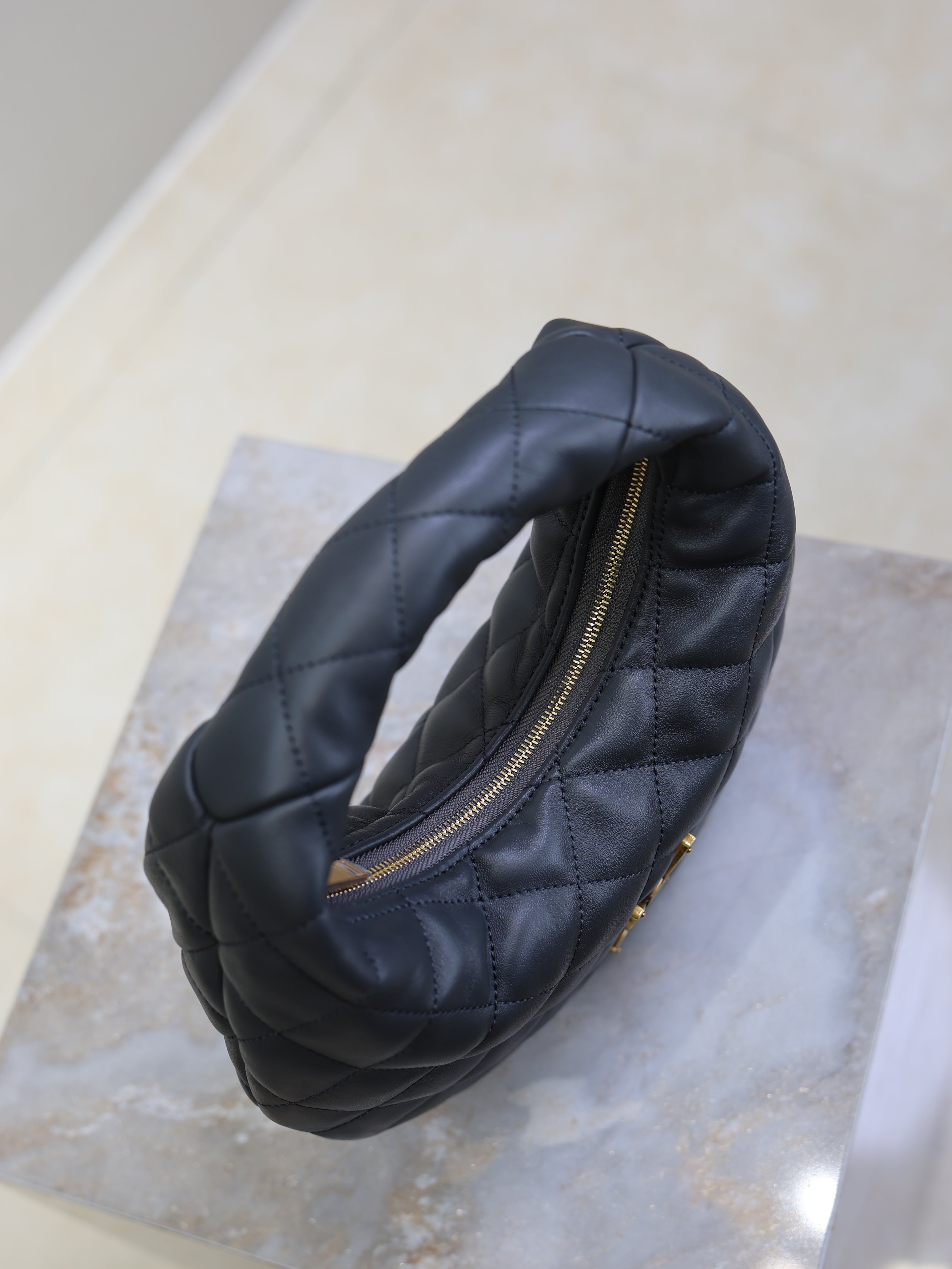 YSL 25S ICARINO 17 IN BLACK QUILTED CALFSKIN GOLD HARDWARE