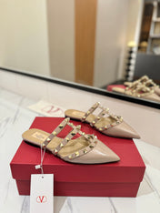 VALENTINO 26S STUDDED FLAT MULES IN NUDE PATENT CALFSKIN