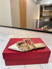VALENTINO 26S STUDDED FLAT MULES IN WHITE PATENT CALFSKIN
